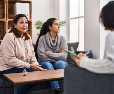 mother and daughter having psychology therapy