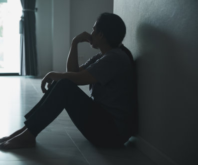 girl sitting on the hallway